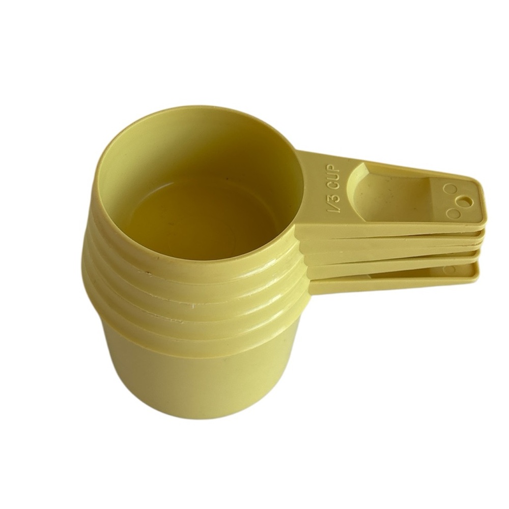 Vintage 1970s Tupperware Yellow Nesting Measuring Cup Set of 5 Made In U.S.A